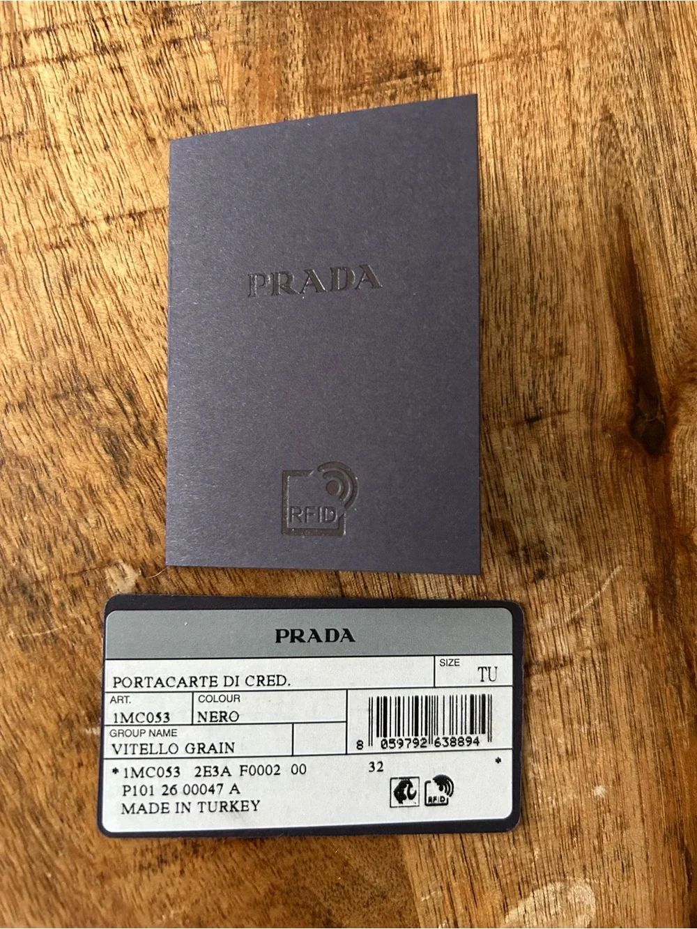 Prada Black Leather Card Holder with Gold Crest